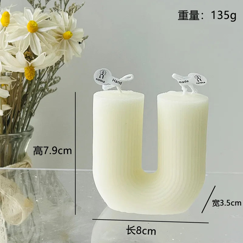 Velas aromáticas con formas geométricas